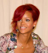 th_60899_RihannasignscopiesofRihannaRihannainNYC27.10.2010_245_122_372lo.jpg